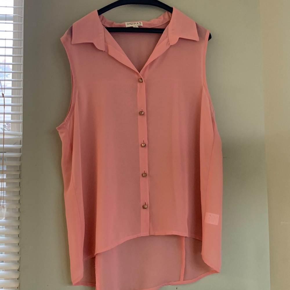 Pink sleeveless blouse